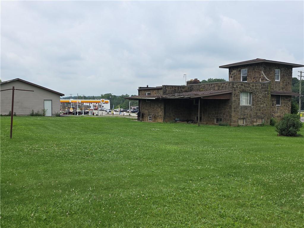 1356 Connellsville Road Lemont Furnace, PA 15456 - Photo 28 of 29 a view of a house with a backyard