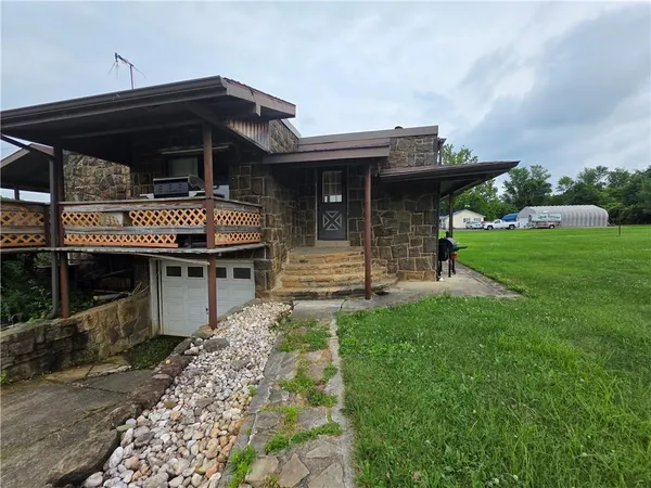 a front view of house with yard