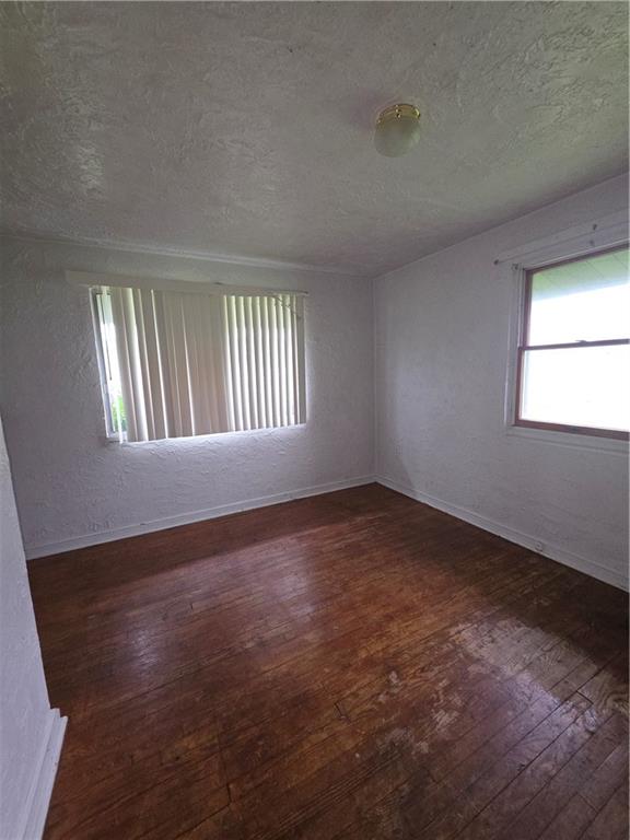 1356 Connellsville Road Lemont Furnace, PA 15456 - Photo 9 of 29 an empty room with a window
