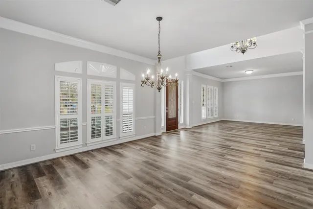 a view of a livingroom with wooden floor