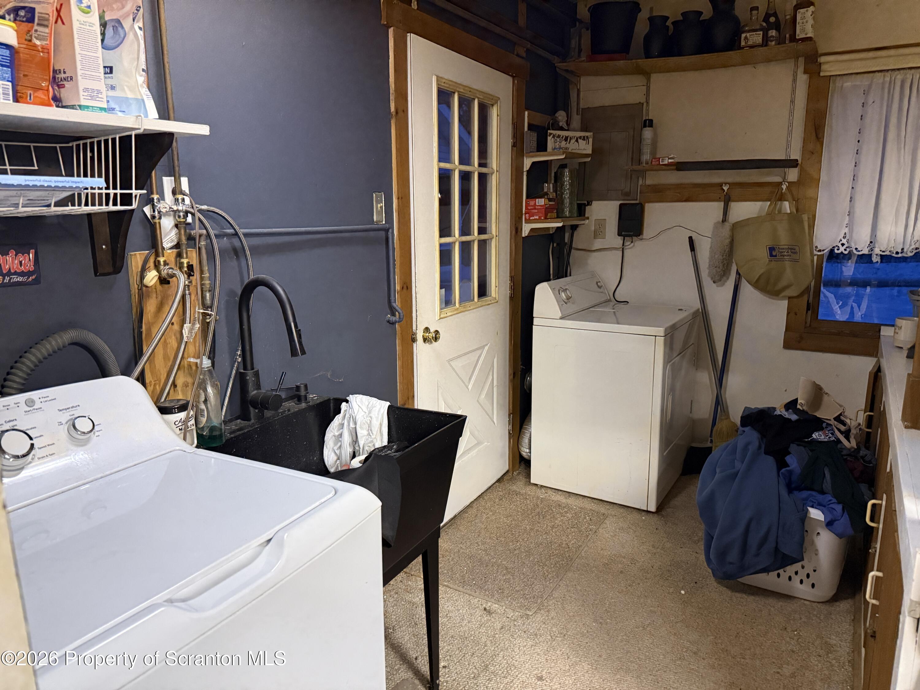 155 Hickory Hill Road Starrucca, PA 18462 - Photo 39 of 46 a view of storage and utility room with washer and dryer