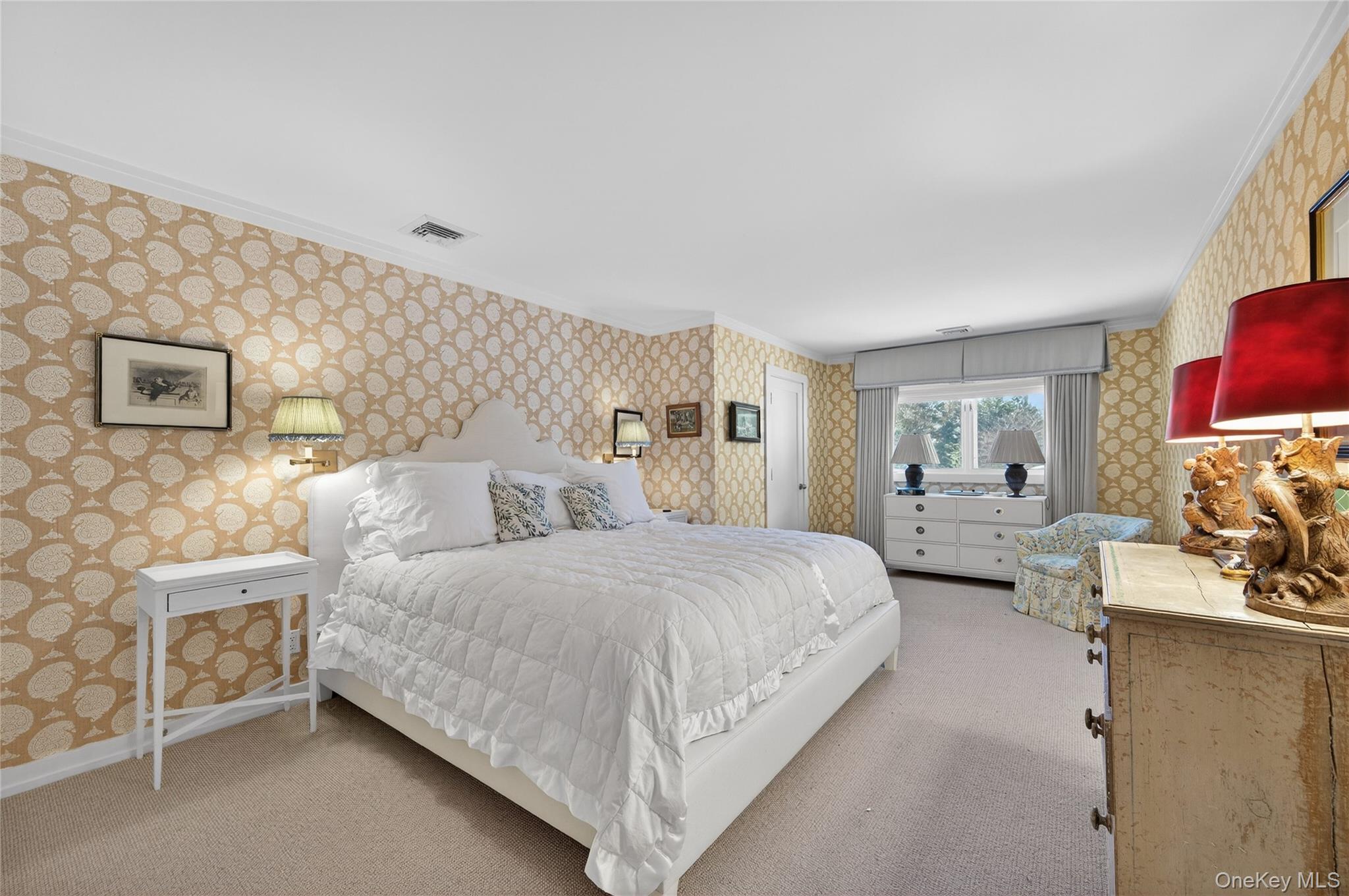 343 Chicken Valley Road Glen Head, NY 11545 - Photo 27 of 49 a bedroom with double bed and a couch
