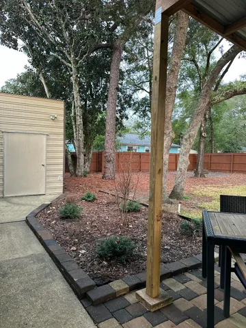 a house with trees in front of it
