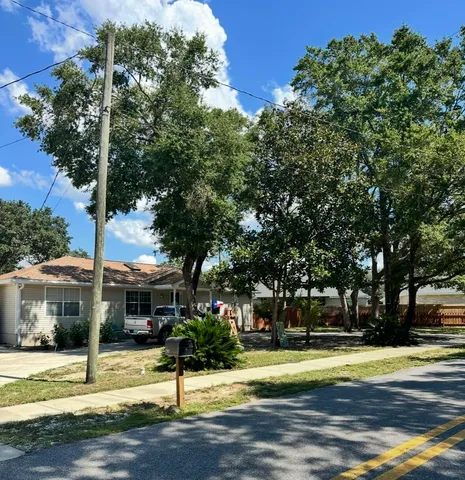 a front view of a house with a garage
