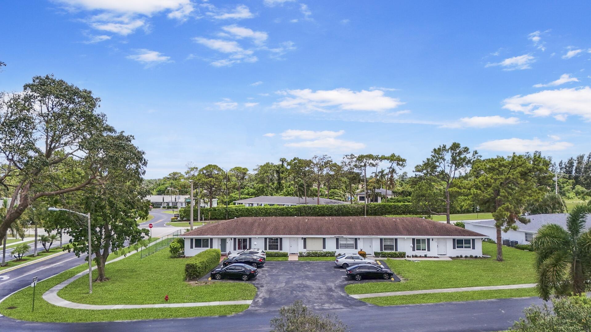 5222 Privet Place, Unit B Delray Beach, FL 33484 - Photo 21 of 27 a aerial view of a house with a big yard