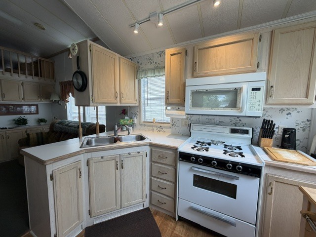 2795 East 28th Road Marseilles, IL 61341 - Photo 14 of 91 a kitchen with a sink stove and cabinets