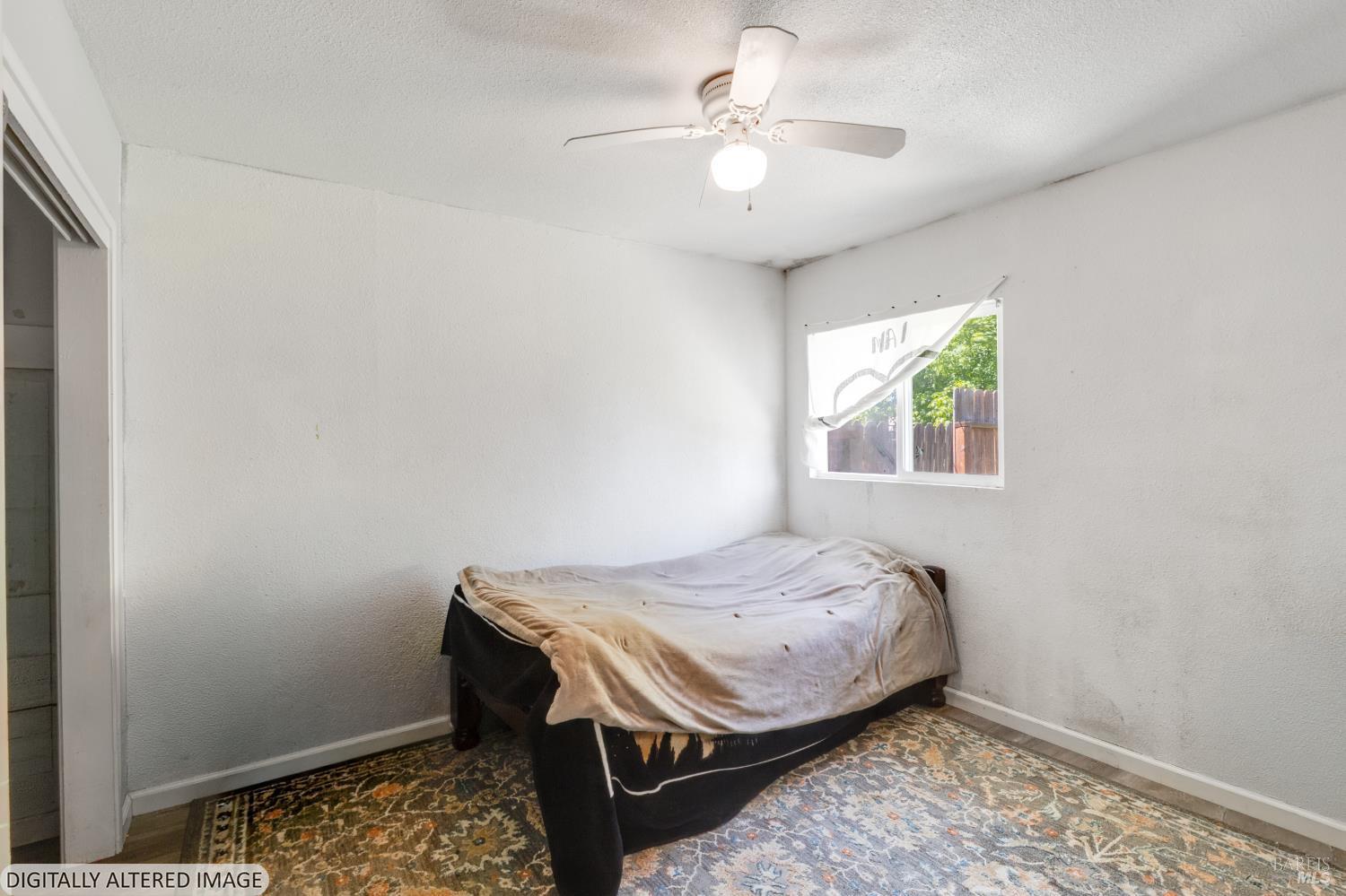 1722 Indiana Street Fairfield, CA 94533 - Photo 15 of 18 a bedroom with a bed and a window