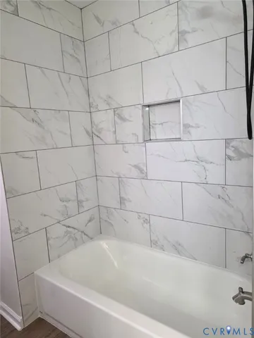 a bathroom with a bathtub