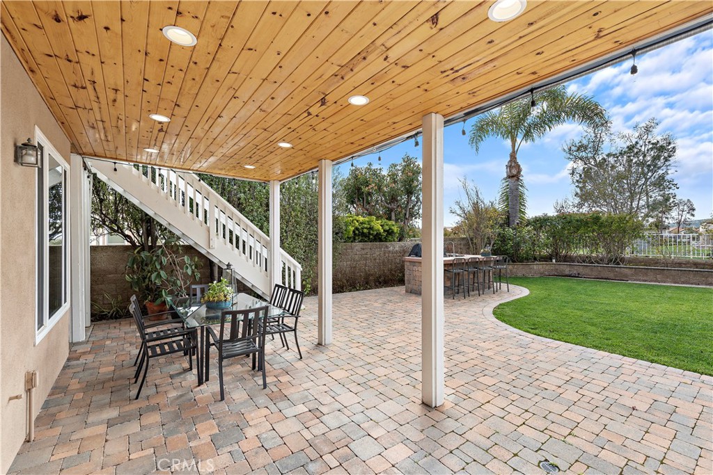 5 High Bluff Laguna Niguel, CA 92677 - Photo 30 of 64 a view of a porch with furniture and garden