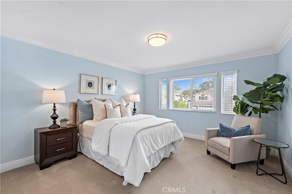 5 High Bluff Laguna Niguel, CA 92677 - Photo 36 of 64 a bedroom with bed couch and window