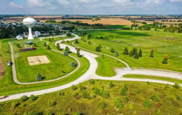 a view of a swimming pool with a garden