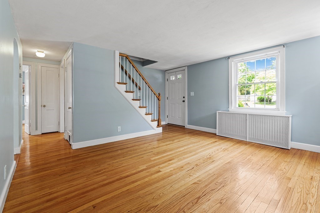 34 Londonderry Road Framingham, MA 01701 - Photo 11 of 33 a view of an empty room with wooden floor and a window