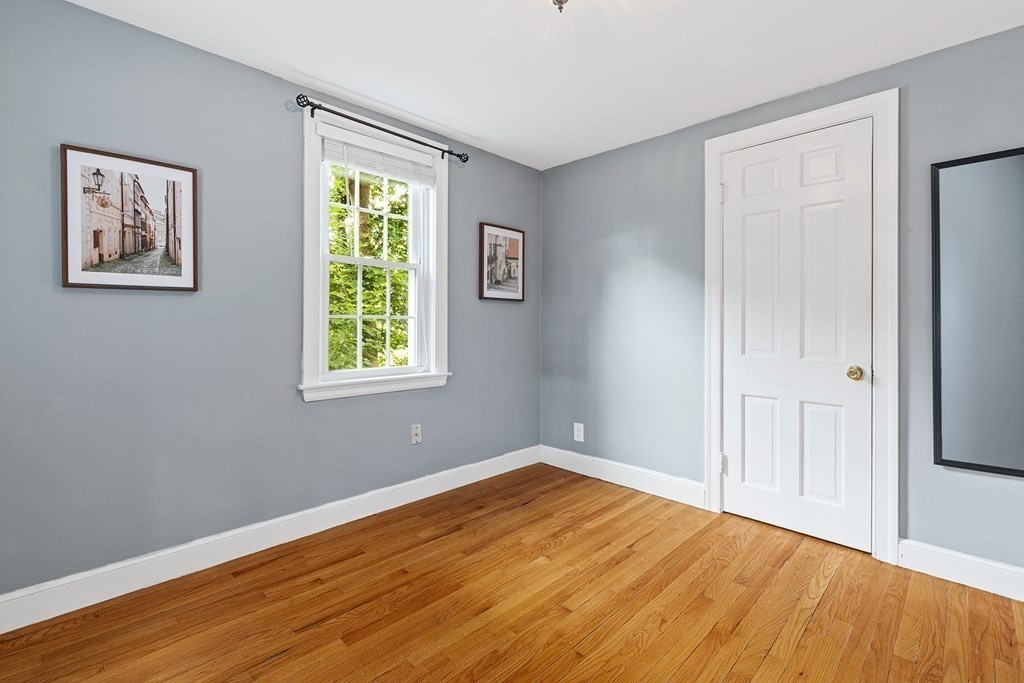 34 Londonderry Road Framingham, MA 01701 - Photo 14 of 33 a view of empty room with wooden floor and fan