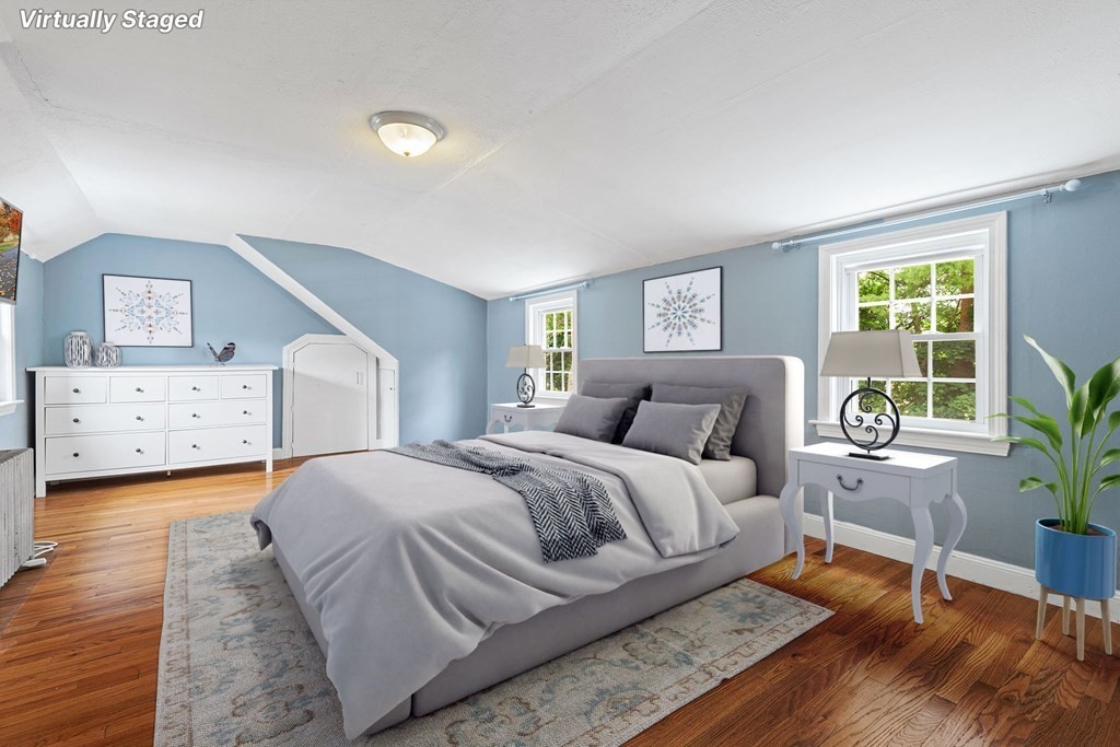 34 Londonderry Road Framingham, MA 01701 - Photo 17 of 33 a spacious bedroom with a bed and wooden floor
