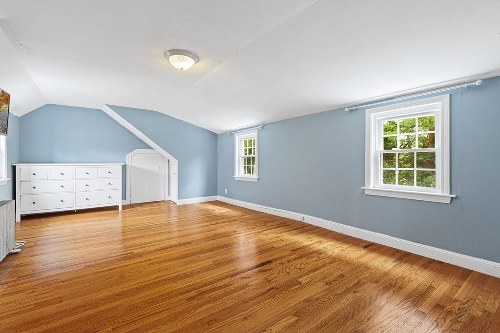34 Londonderry Road Framingham, MA 01701 - Photo 18 of 33 an empty room with wooden floor and windows