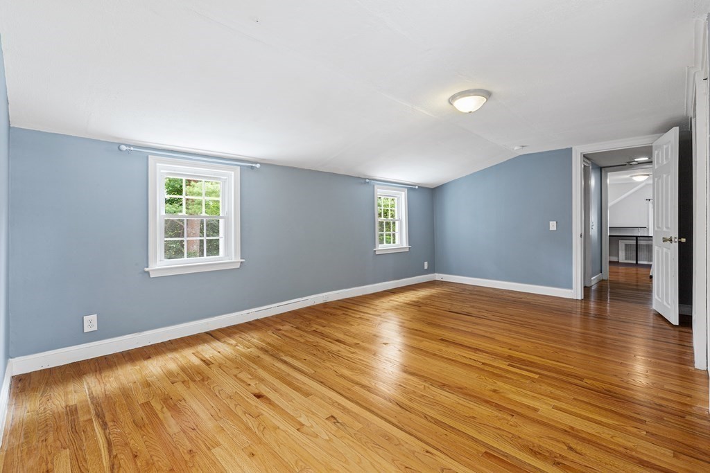 34 Londonderry Road Framingham, MA 01701 - Photo 19 of 33 a view of empty room with wooden floor and fan