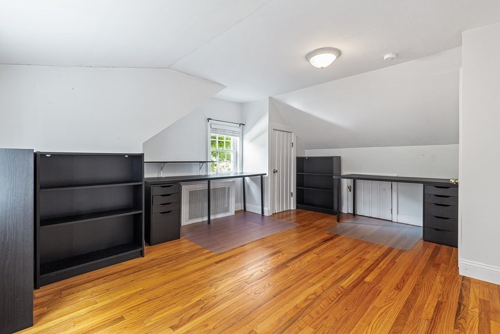 34 Londonderry Road Framingham, MA 01701 - Photo 20 of 33 a view of a room with wooden floor and staircase