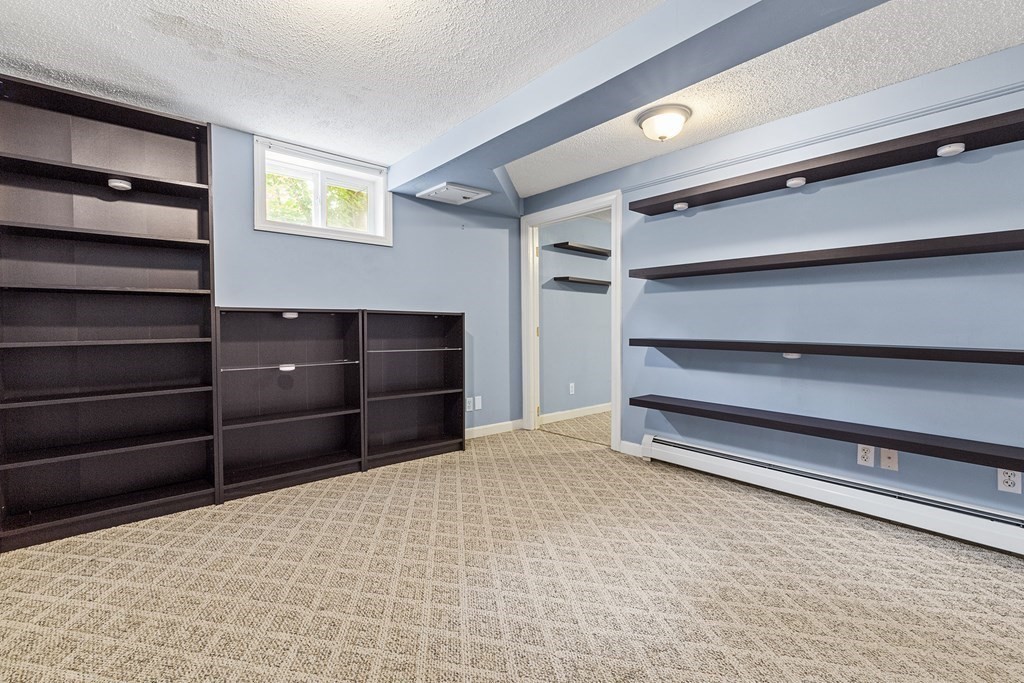 34 Londonderry Road Framingham, MA 01701 - Photo 25 of 33 a room with a dresser