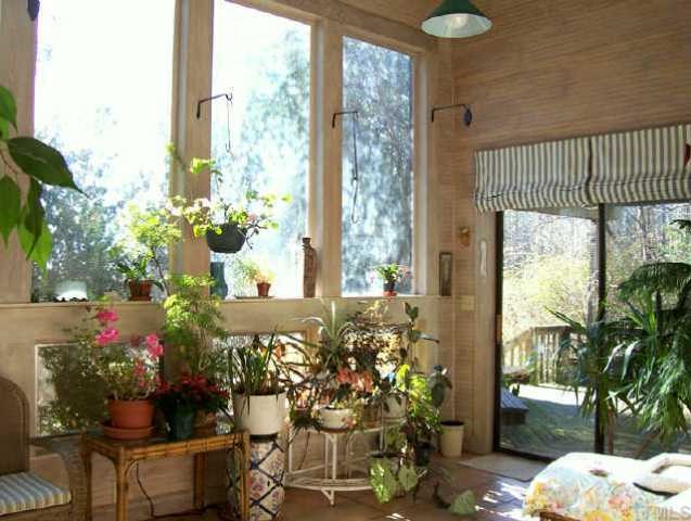 6323 Mt Mitchell Road Efland, NC 27243 - Photo 2 of 10 Sunny sunroom!