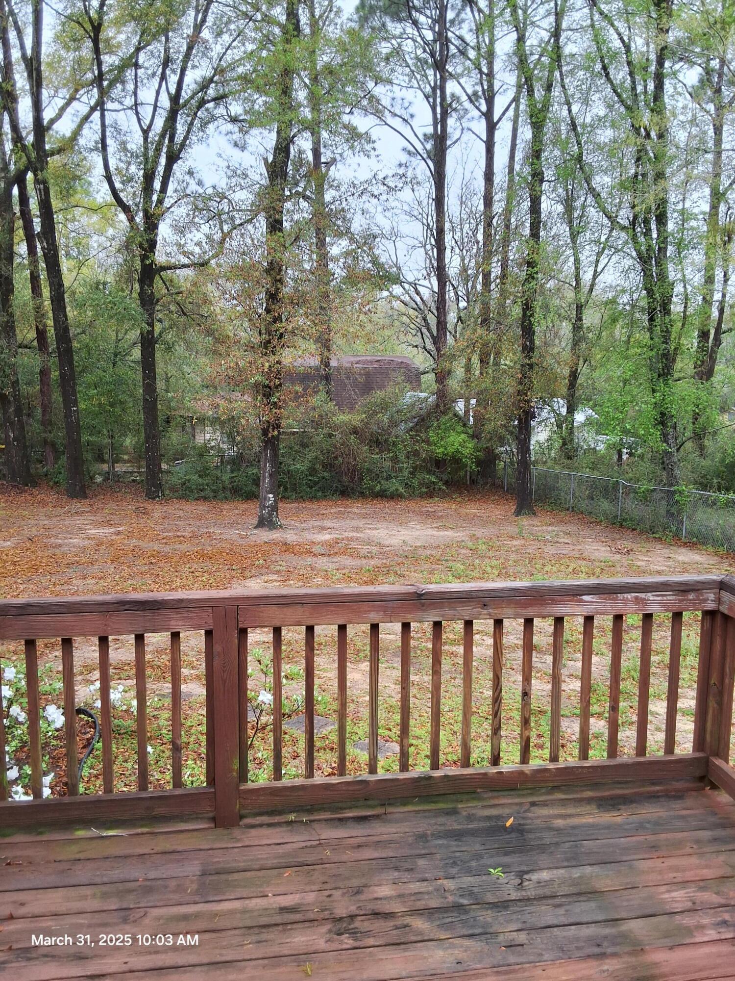 701 Georgia Street Crestview, FL 32536 - Photo 14 of 26 a view of a wooden deck
