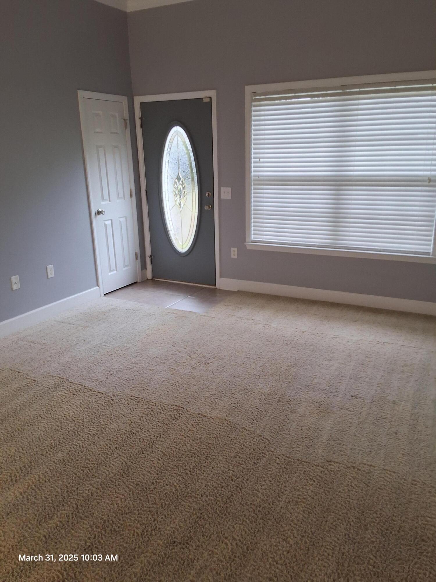 701 Georgia Street Crestview, FL 32536 - Photo 15 of 26 a view of a room with wooden floor and a window