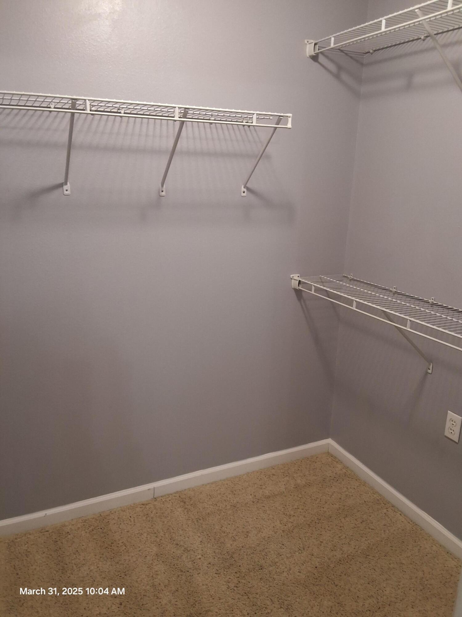701 Georgia Street Crestview, FL 32536 - Photo 16 of 26 a view of a room with racks on the wall