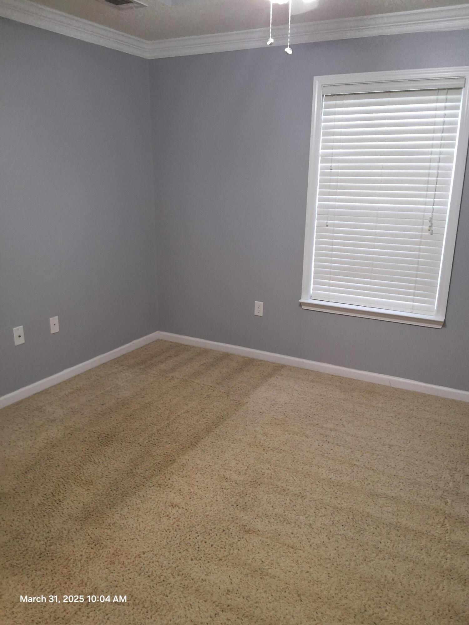 701 Georgia Street Crestview, FL 32536 - Photo 19 of 26 an empty room with a window
