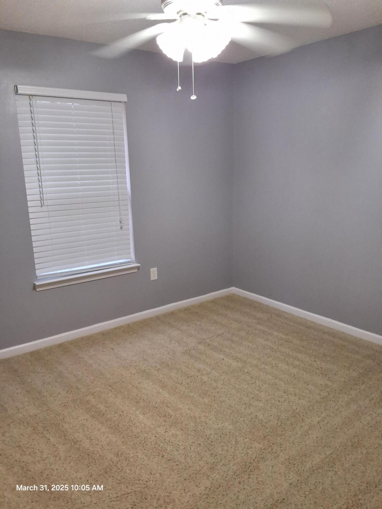 701 Georgia Street Crestview, FL 32536 - Photo 20 of 26 an empty room with a window
