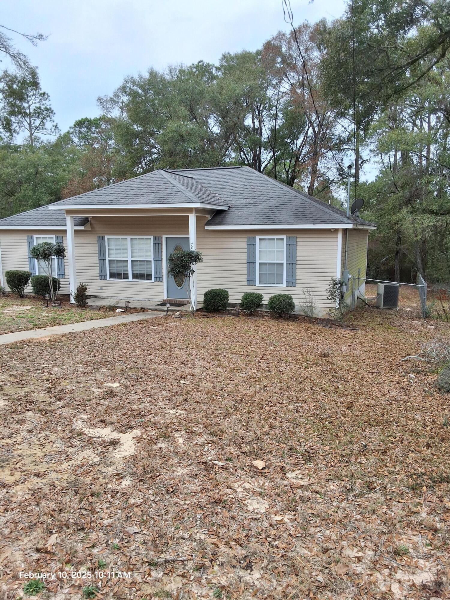 701 Georgia Street Crestview, FL 32536 - Photo 2 of 26 front view of a house with a yard