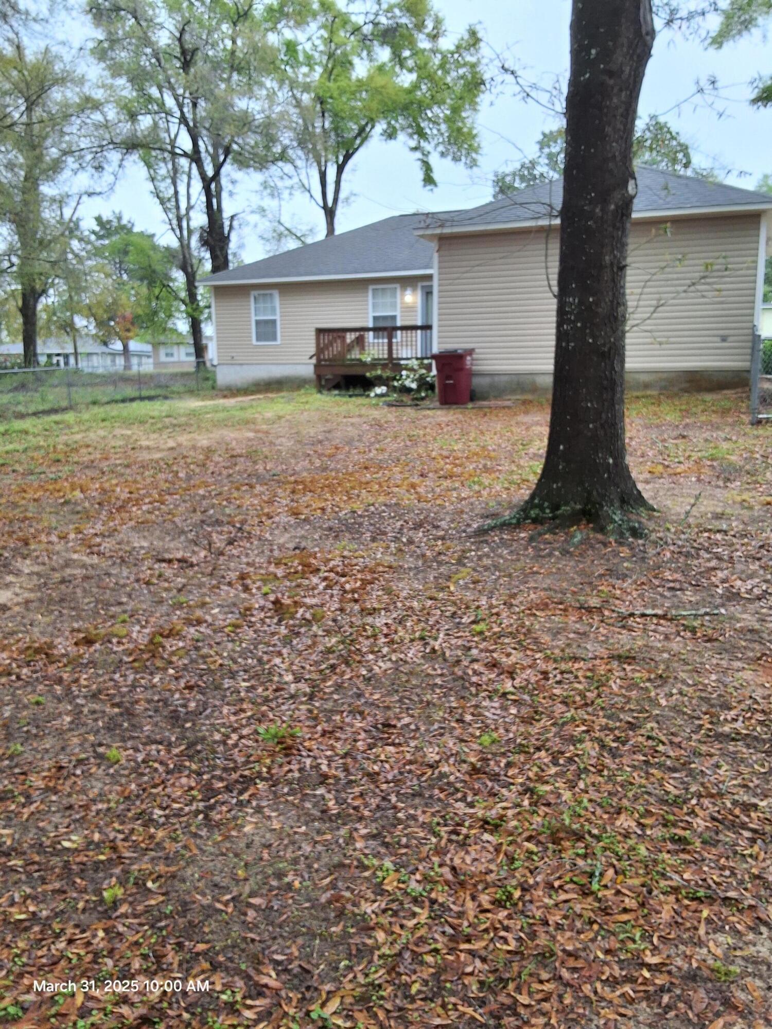 701 Georgia Street Crestview, FL 32536 - Photo 5 of 26 a view of a house with a yard