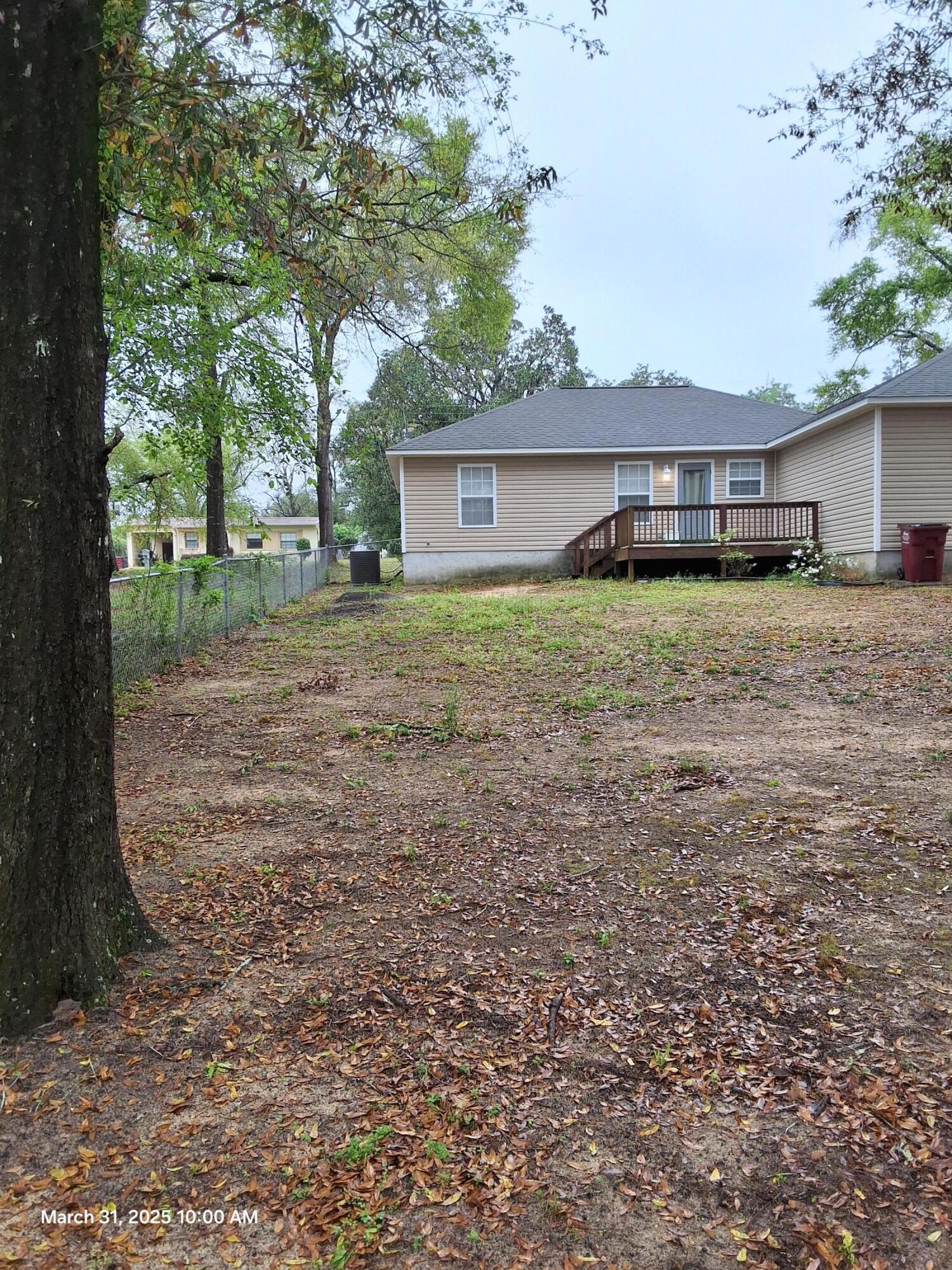 701 Georgia Street Crestview, FL 32536 - Photo 7 of 26 a view of a house with a yard