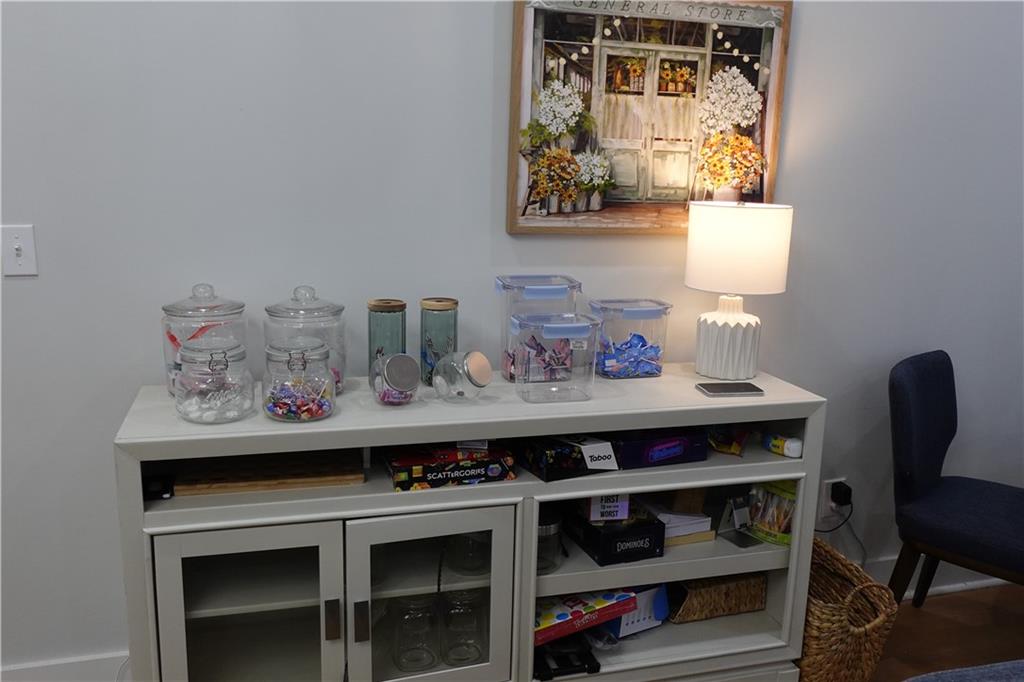 3473 Harding Avenue Atlanta, GA 30354 - Photo 17 of 25 a view of a workspace with furniture and wooden floor