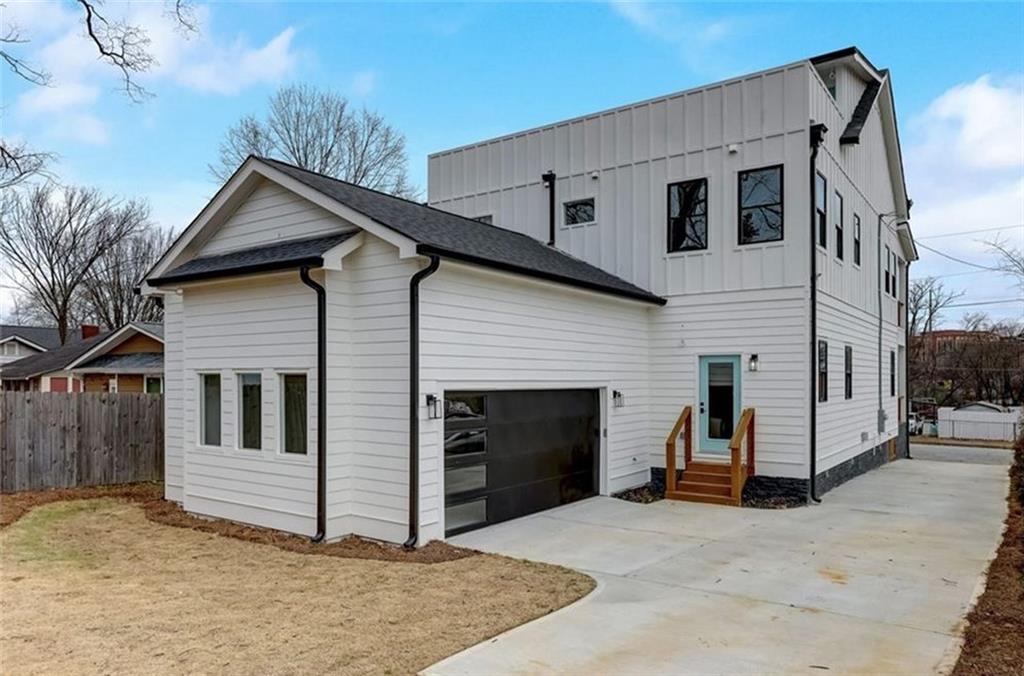 3473 Harding Avenue Atlanta, GA 30354 - Photo 2 of 25 a view of a house with a garage