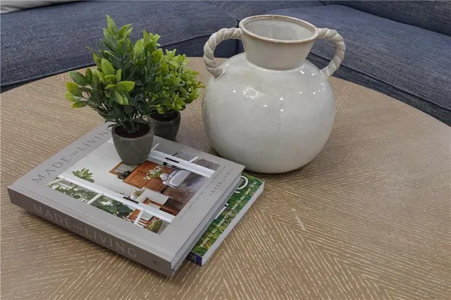 a vase of flowers sitting on a table
