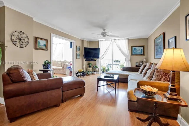a living room with furniture fireplace and a window