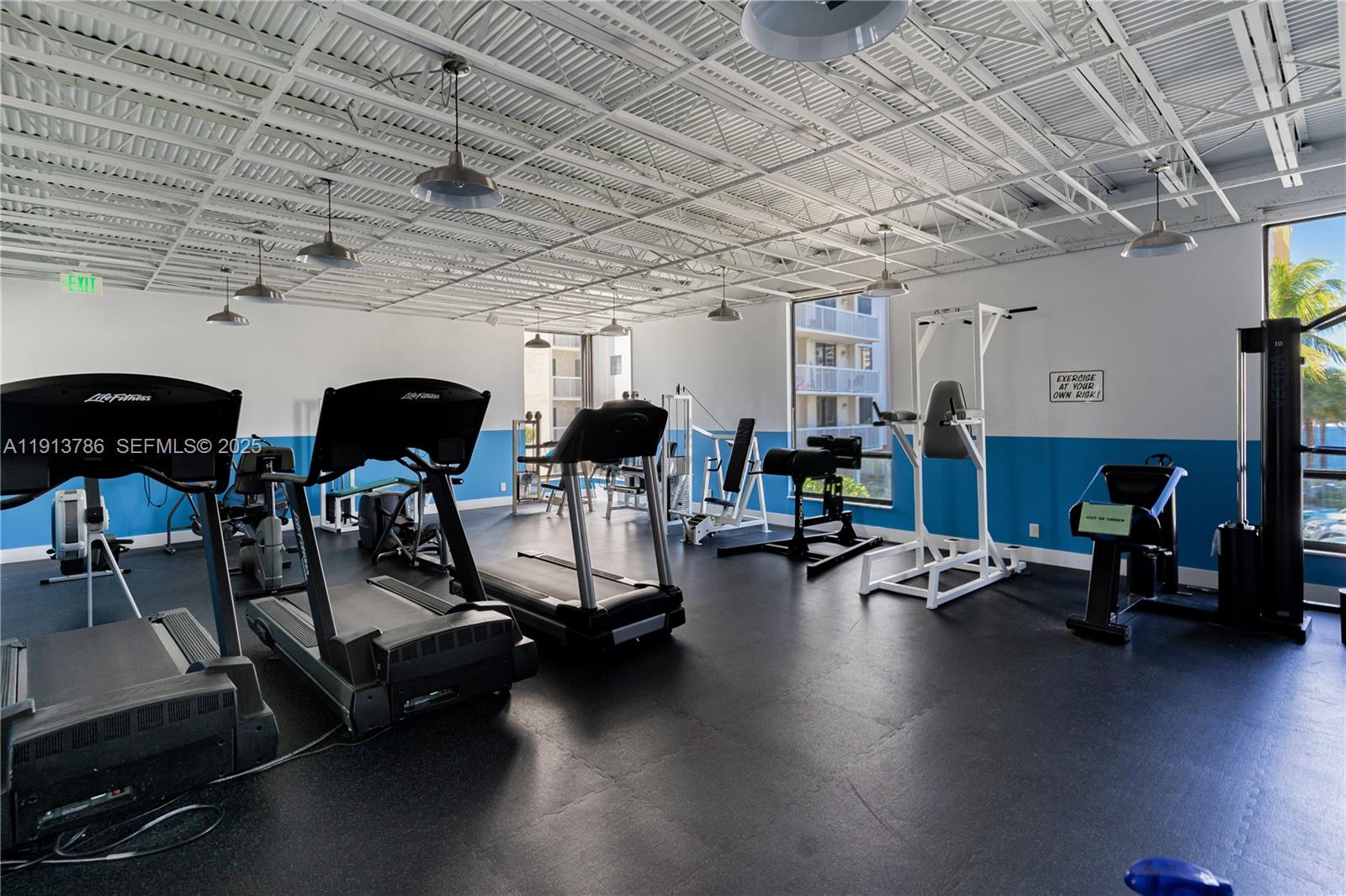 1500 South Ocean Drive, Unit 9J Hollywood, FL 33019 - Photo 26 of 32 a view of a room with gym equipment