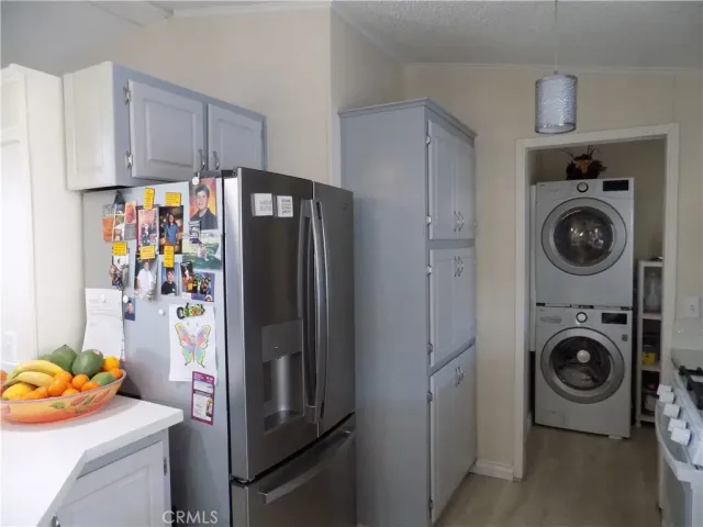 a utility room with sink dryer and washer