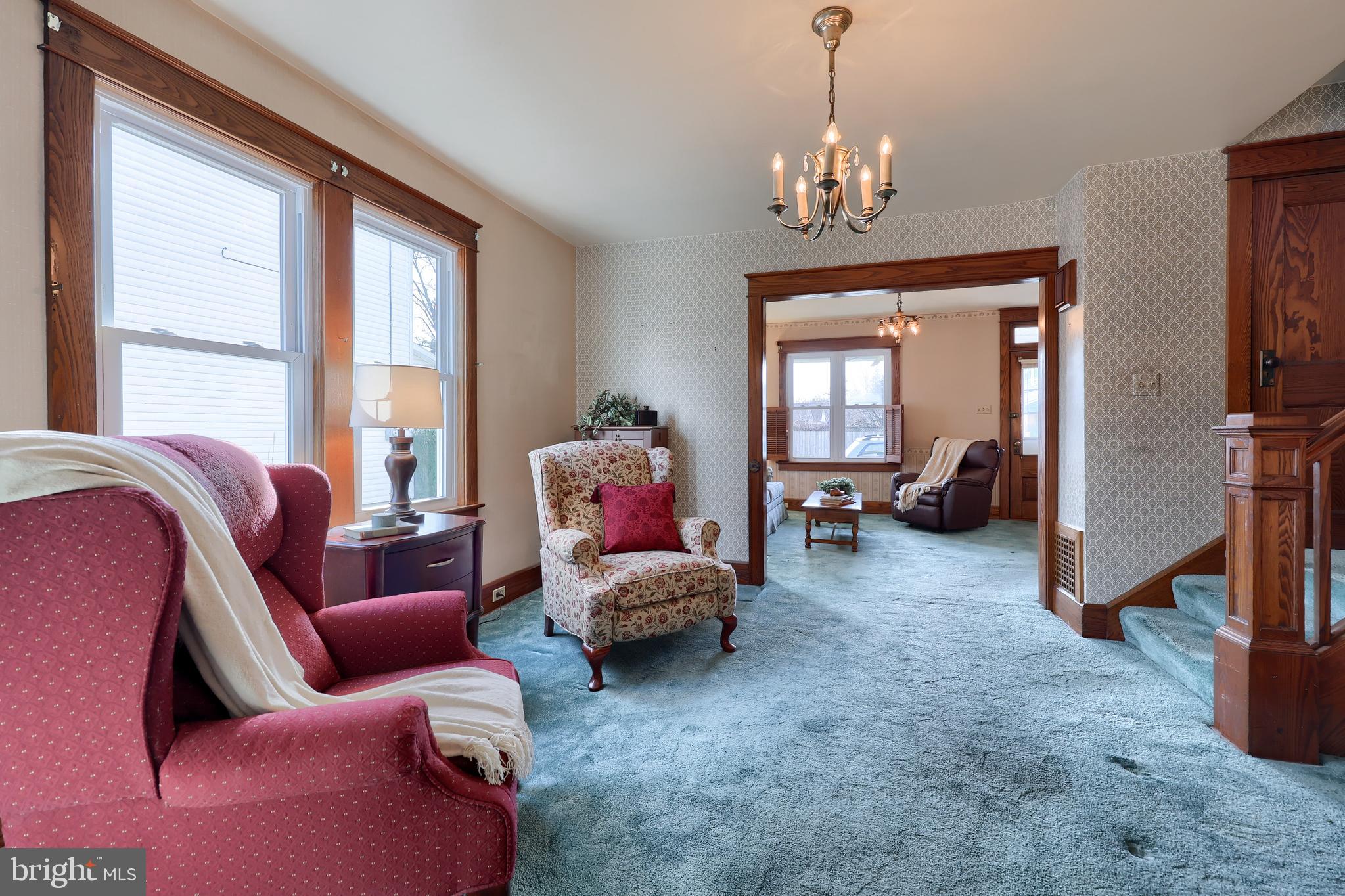 405 South Cedar Street Lititz, PA 17543 - Photo 12 of 42 a living room with furniture and a chandelier