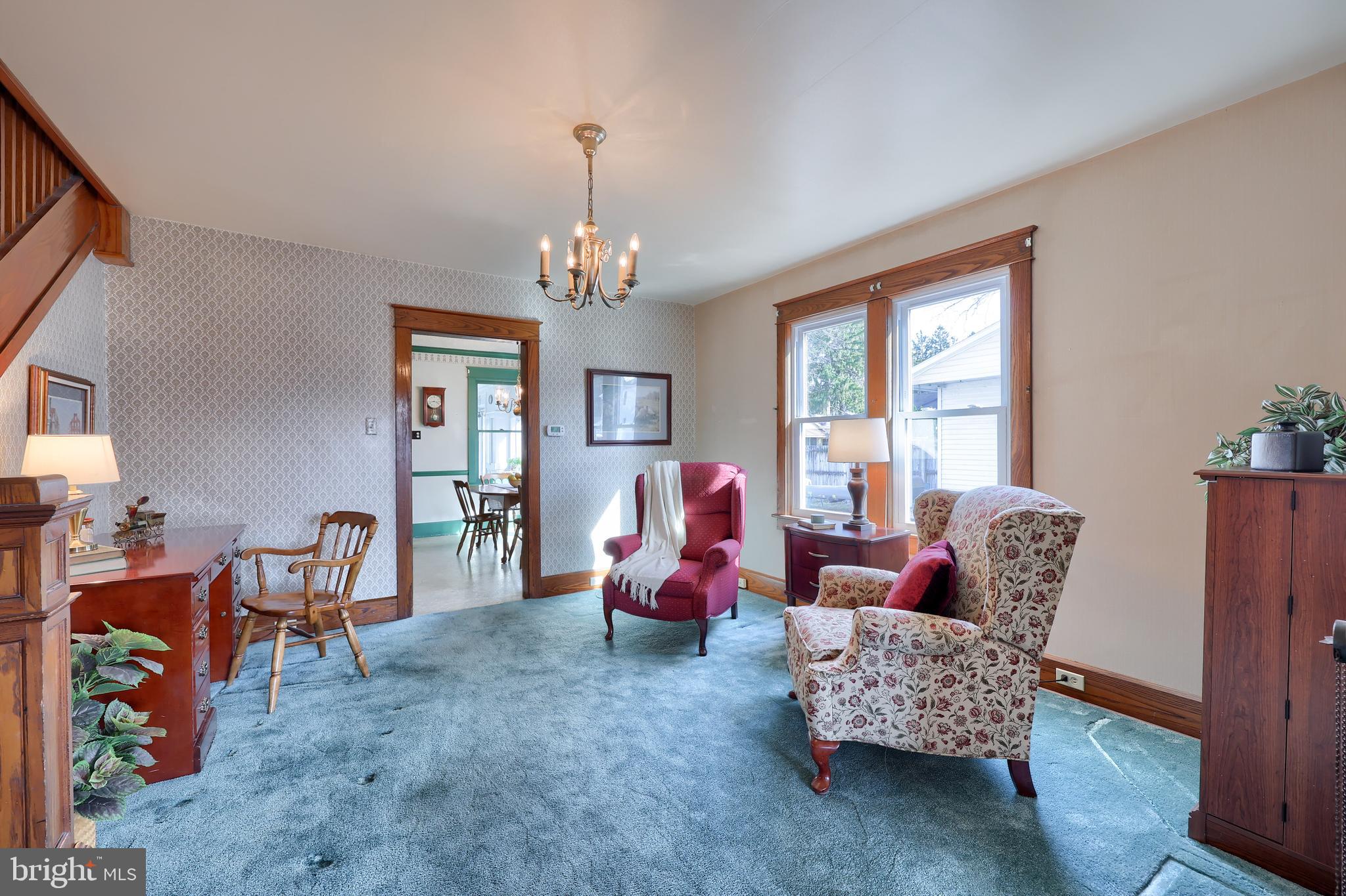 405 South Cedar Street Lititz, PA 17543 - Photo 10 of 42 a living room with furniture chandelier and a window