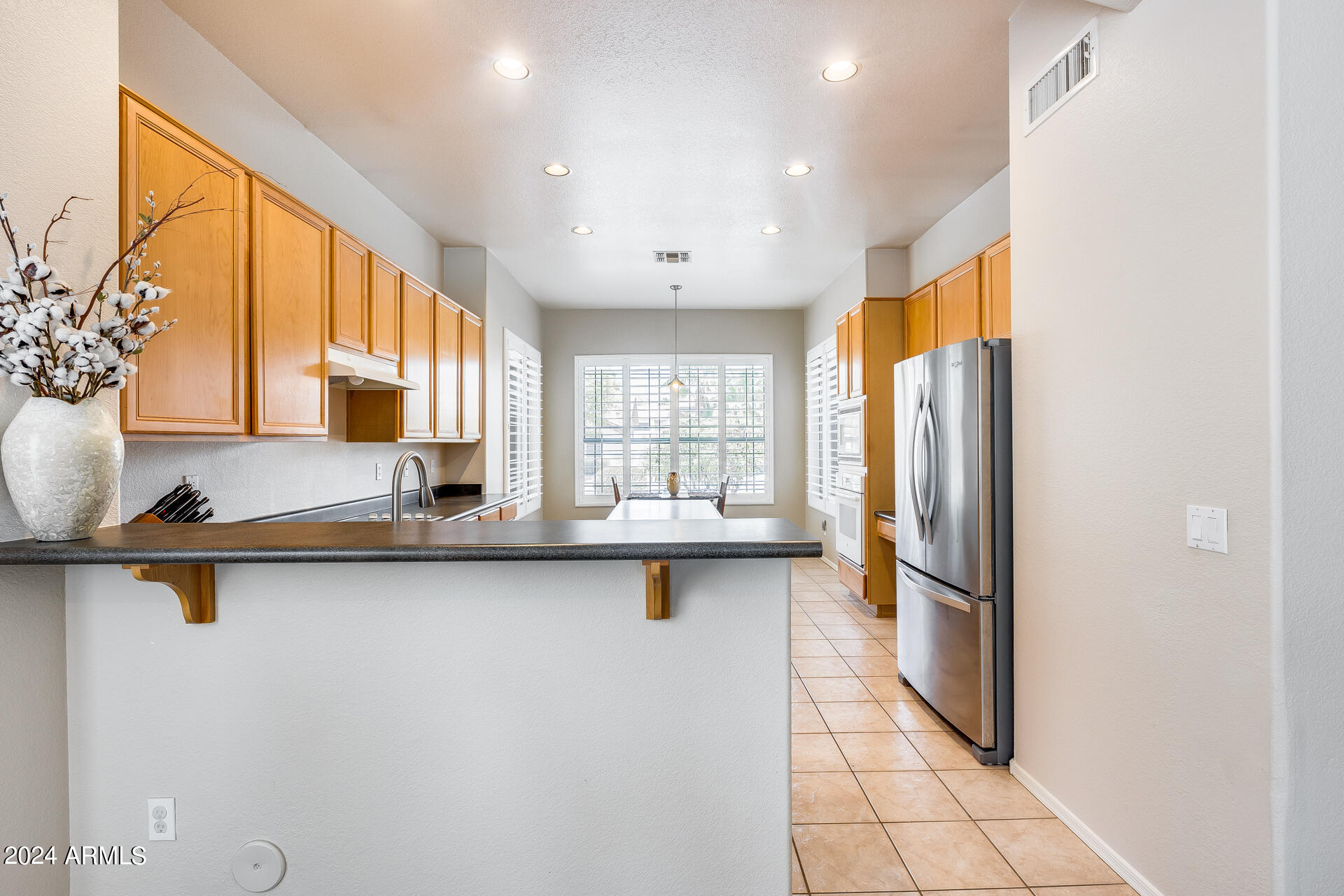 11418 South Santa Fe Lane Goodyear, AZ 85338 - Photo 11 of 46 10