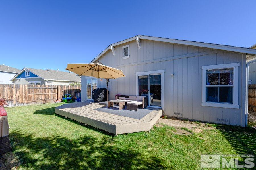 7635 Corso Street Reno, NV 89506 - Photo 19 of 19 a view of a house with backyard porch and sitting area