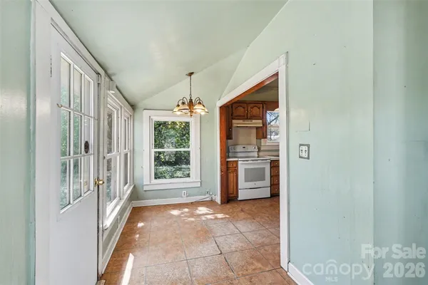 a view of a hallway with windows