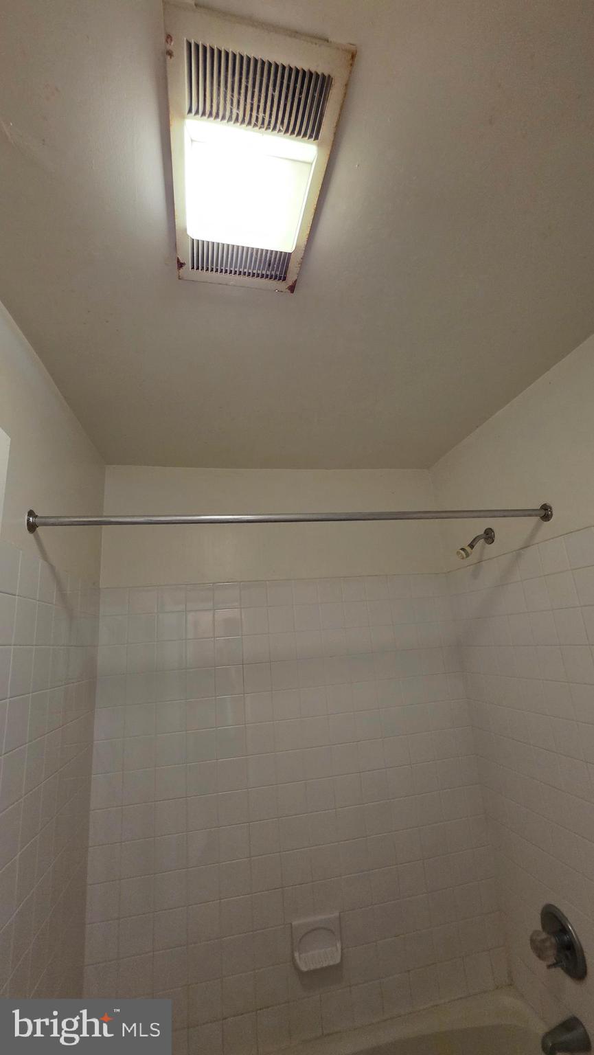3928 Rolling Rd., Unit C10 Pikesville, MD 21208 - Photo 22 of 26 a view of a small space with racks on the wall