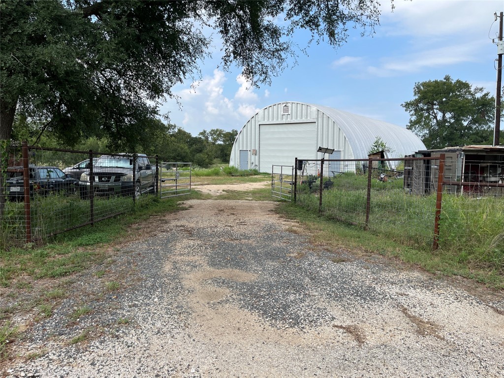 2130 County Line Road Dale, TX 78616 - Photo 1 of 1 a view of backyard with green space