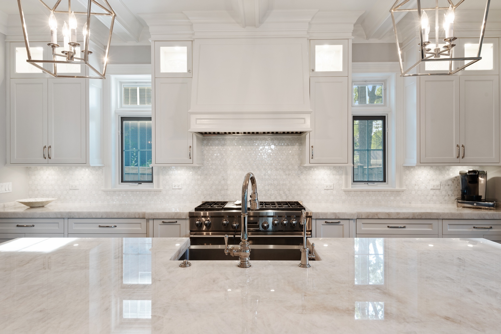 Undisclosed Address Wilmette, IL 60091 - Photo 13 of 66 a kitchen with granite countertop a stove and cabinets