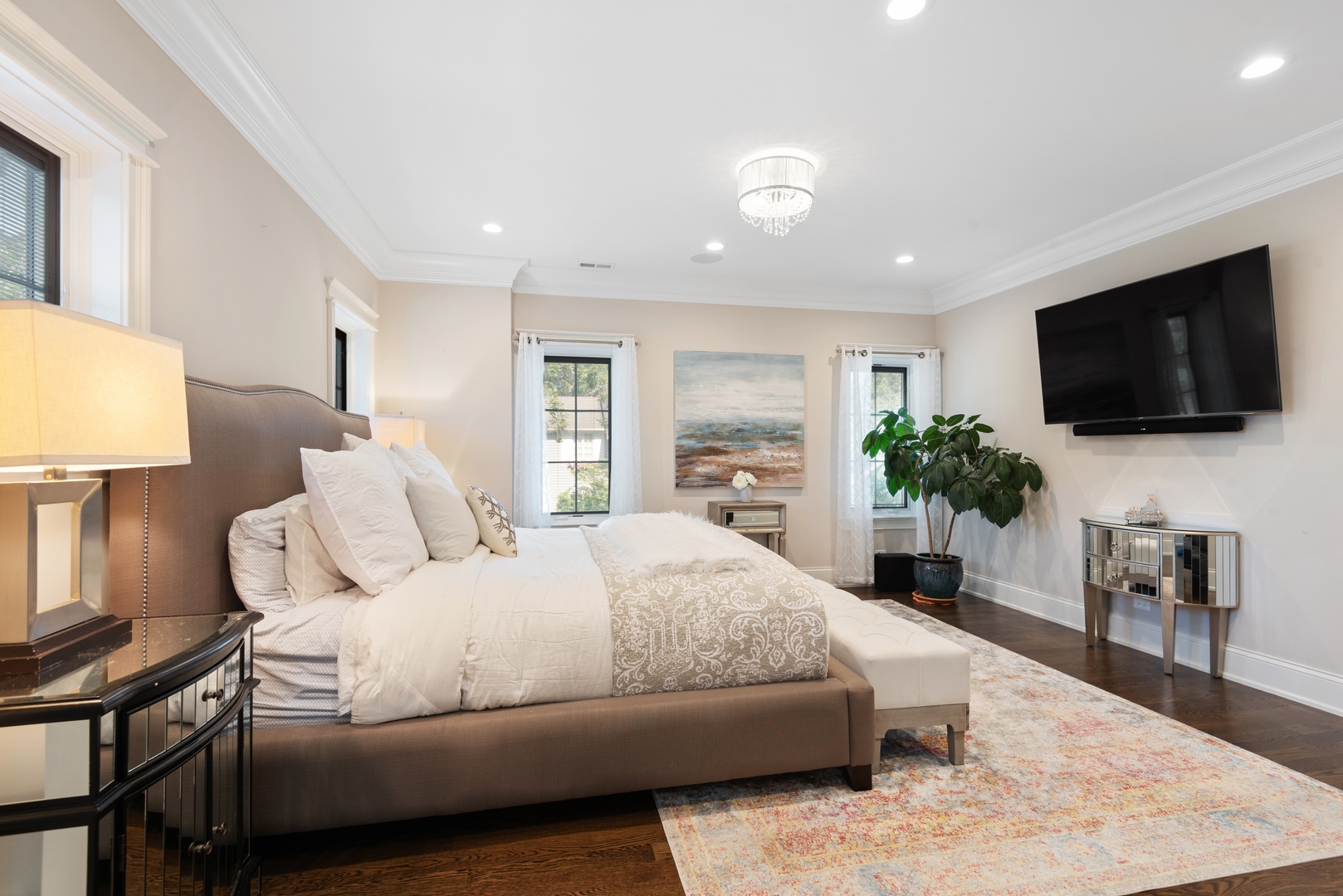 Undisclosed Address Wilmette, IL 60091 - Photo 27 of 66 a bedroom with a large bed and a flat screen tv