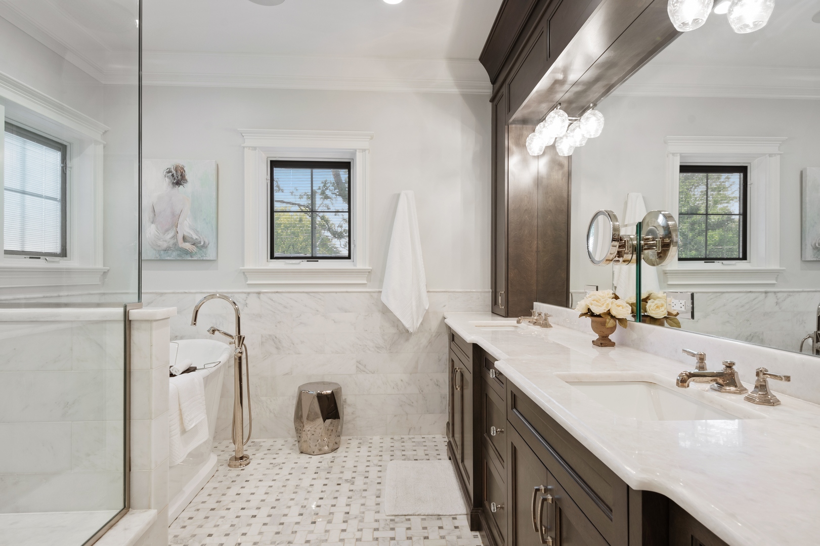 Undisclosed Address Wilmette, IL 60091 - Photo 28 of 66 a bathroom with a sink and a mirror