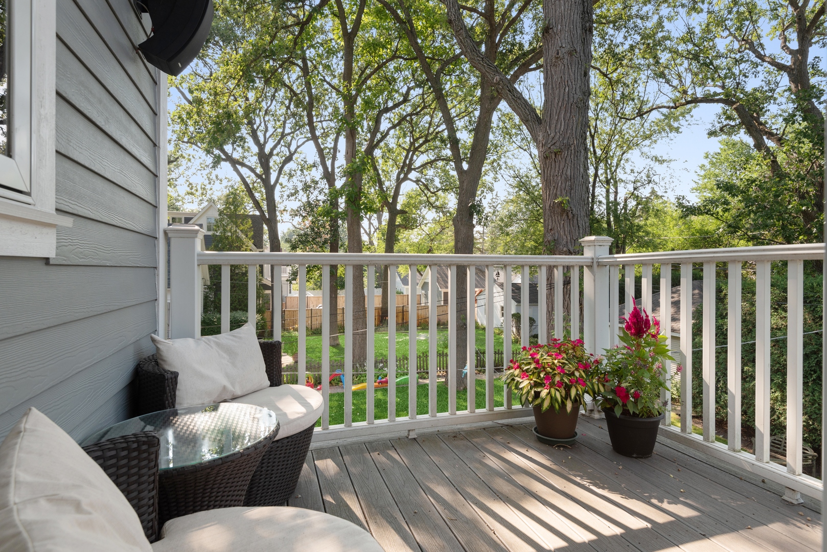 Undisclosed Address Wilmette, IL 60091 - Photo 31 of 66 a view of a deck with couches and potted plants