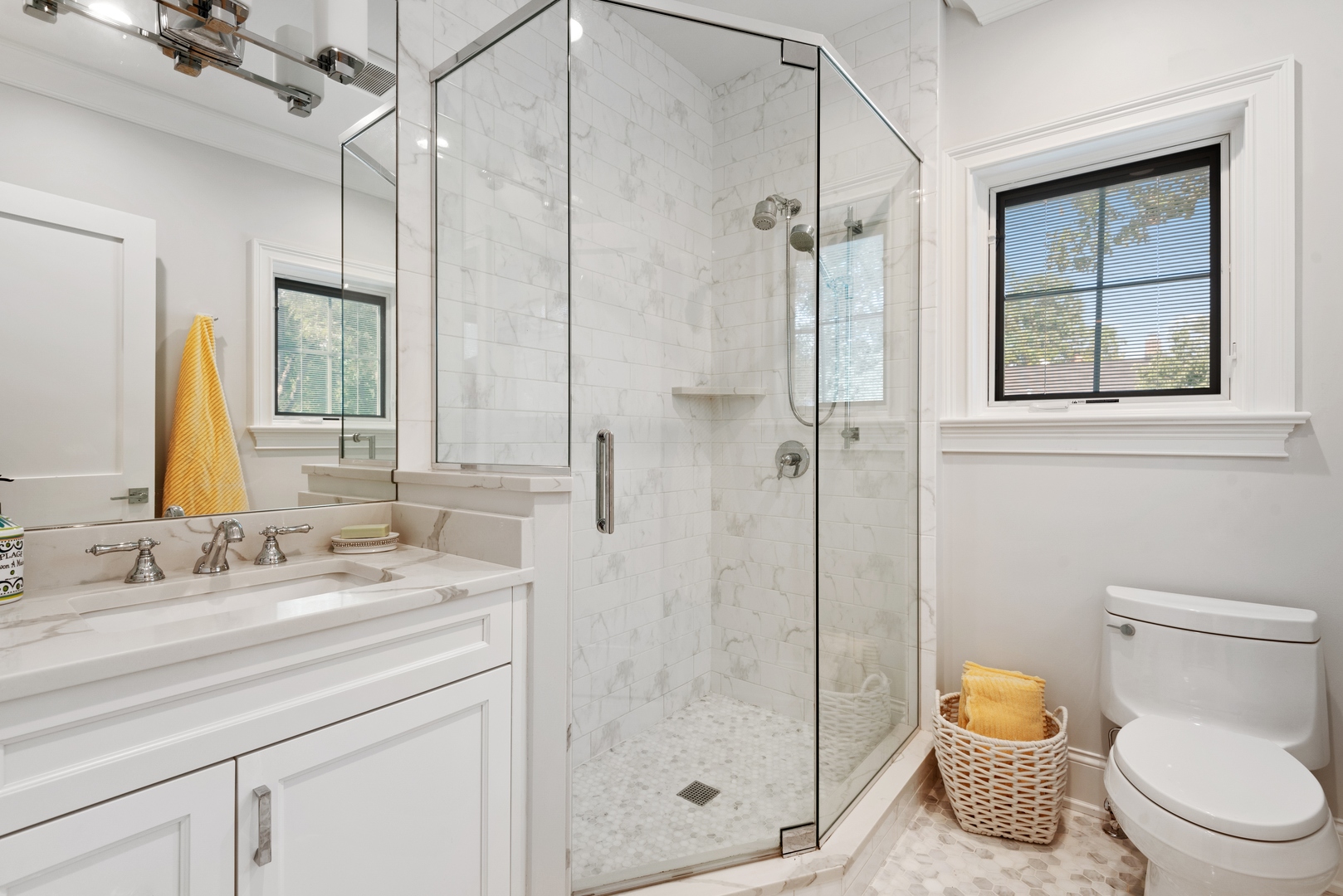 Undisclosed Address Wilmette, IL 60091 - Photo 36 of 66 a bathroom with a granite countertop toilet sink and shower