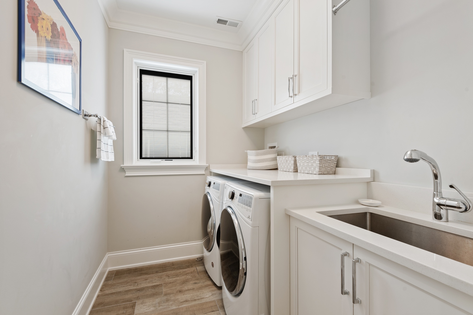 Undisclosed Address Wilmette, IL 60091 - Photo 37 of 66 a utility room with sink dryer and washer